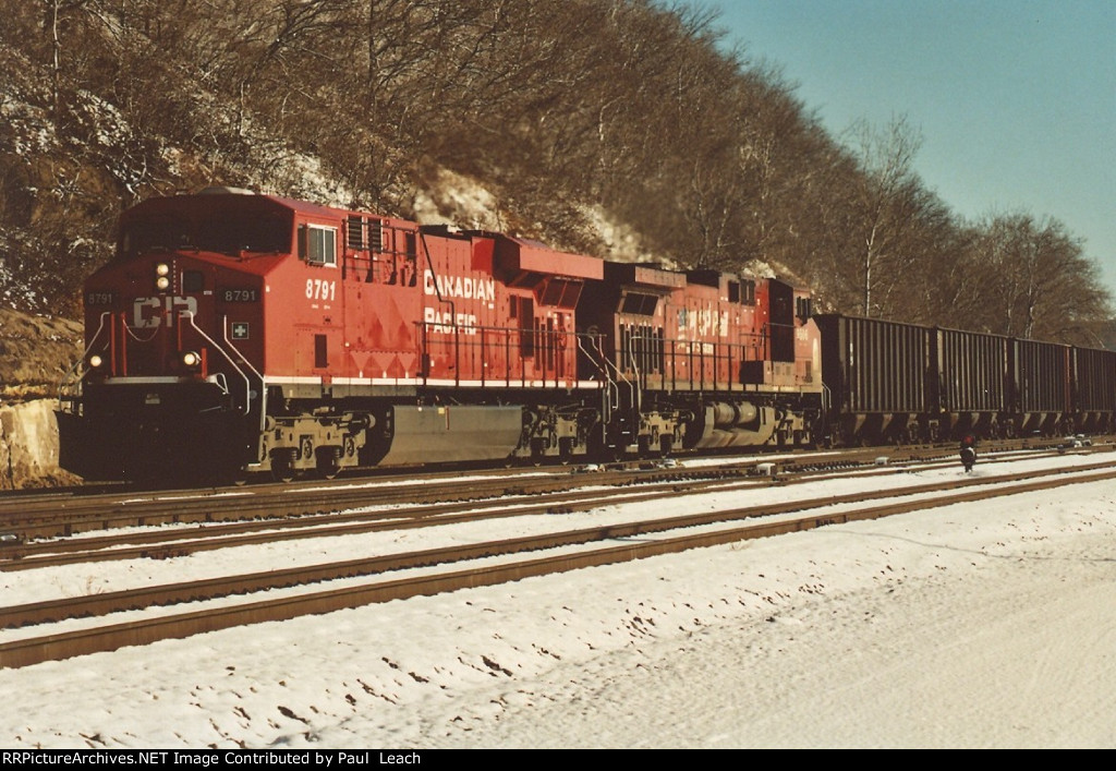 Coke empties roll west